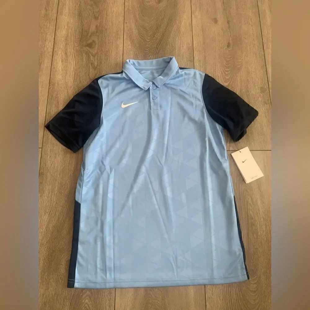 Nike youth unisex football/soccer polo shirt.